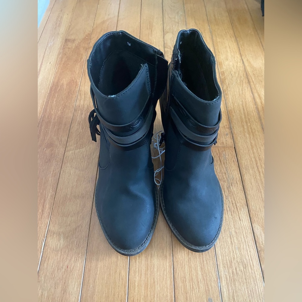 New black booties with tags